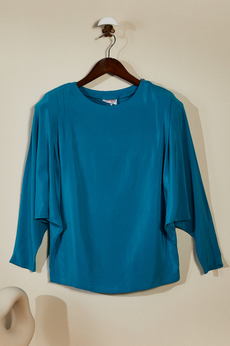 Turquoise silk blouse