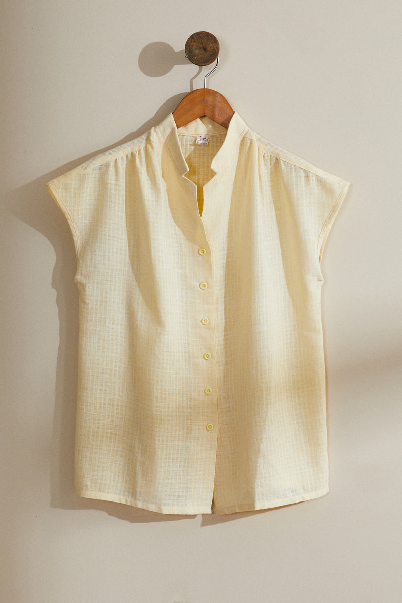Light yellow blouse