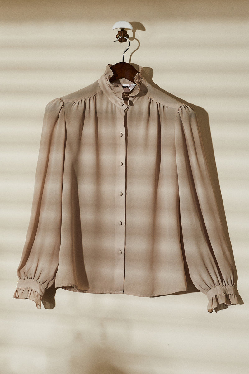 Beige ruffled shirt