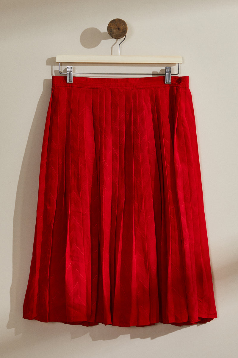 Red pleated midi skirt