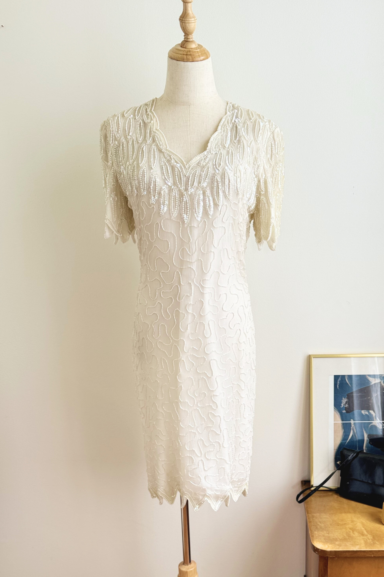 Short beige embroidered dress