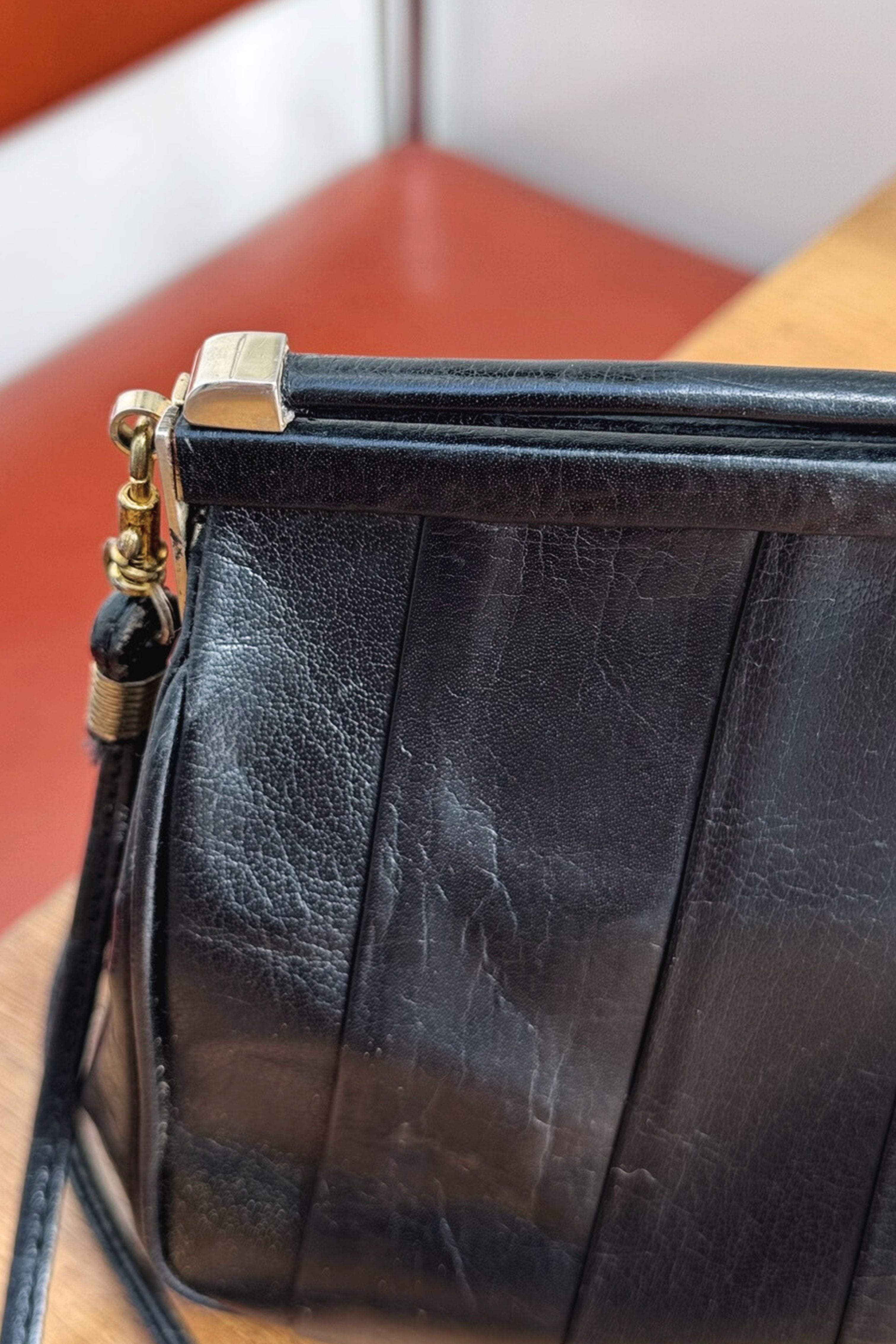 Sac à main en cuir vernis noir