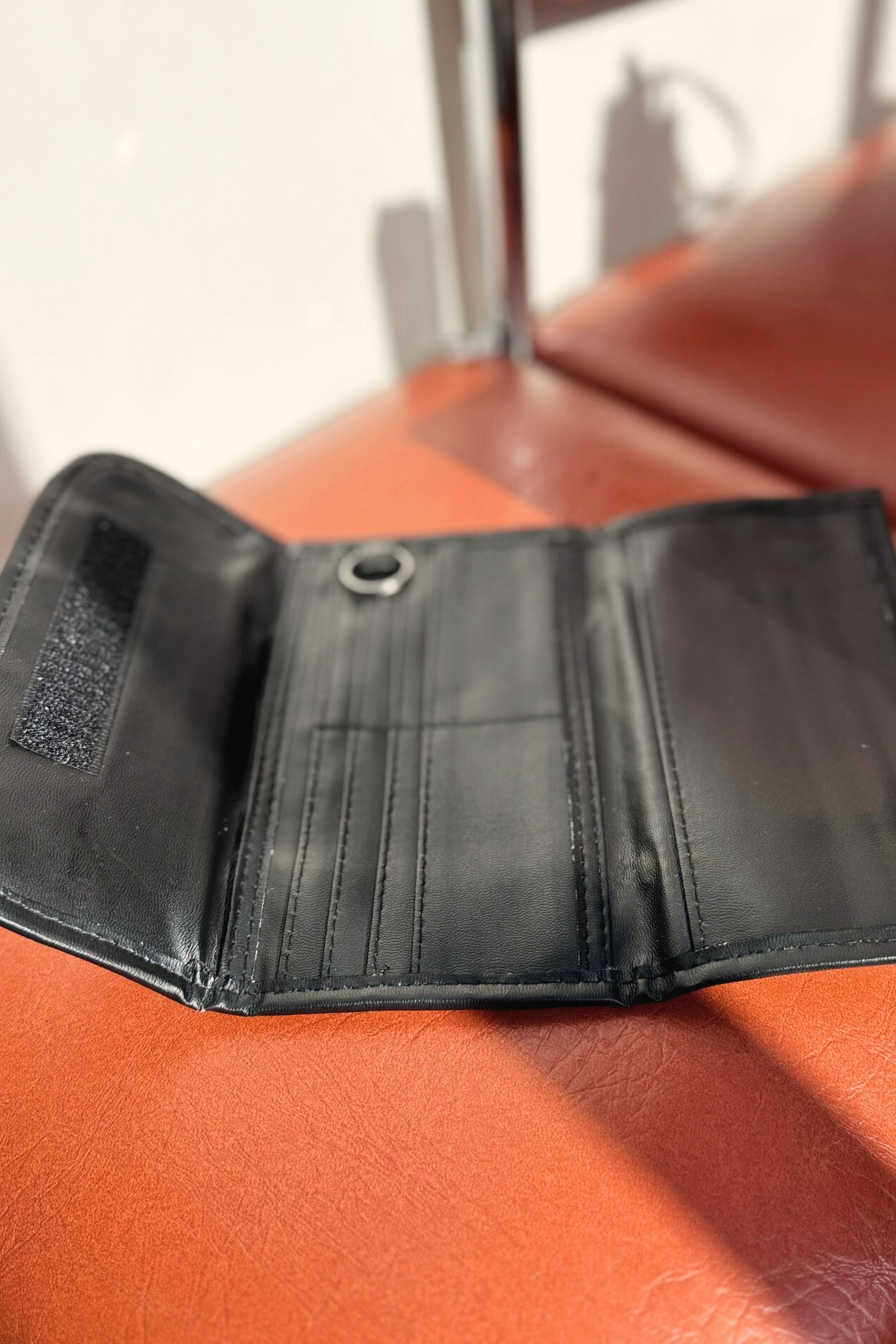 Porte carte matelassé en cuir noir