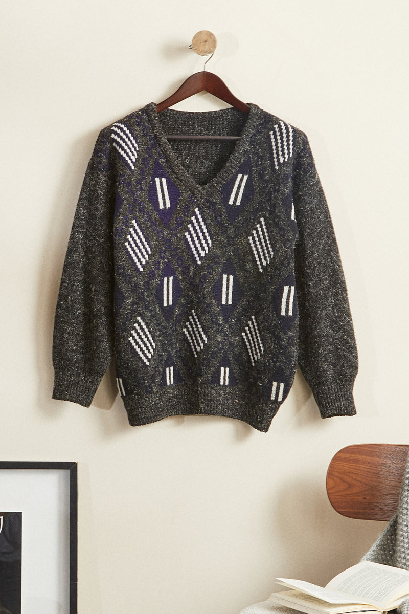 Pull à motifs gris