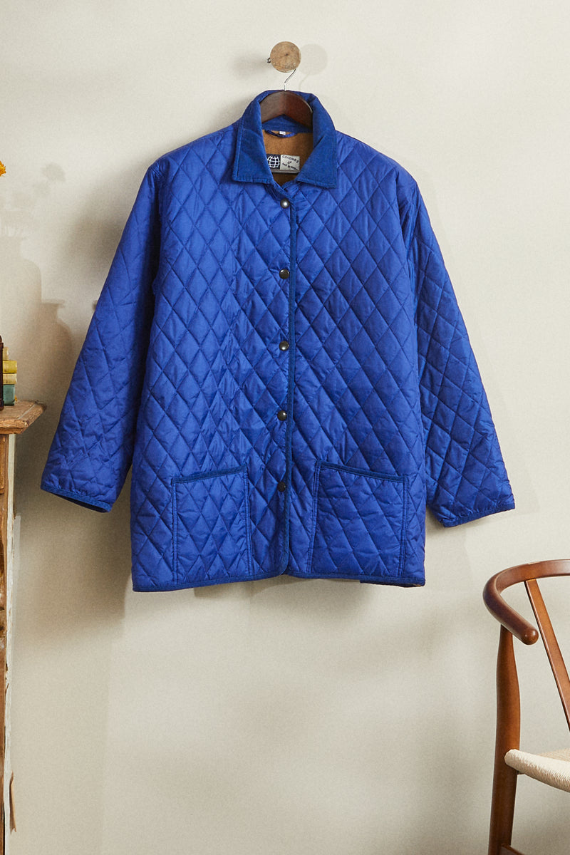 Blouson matelassé long bleu