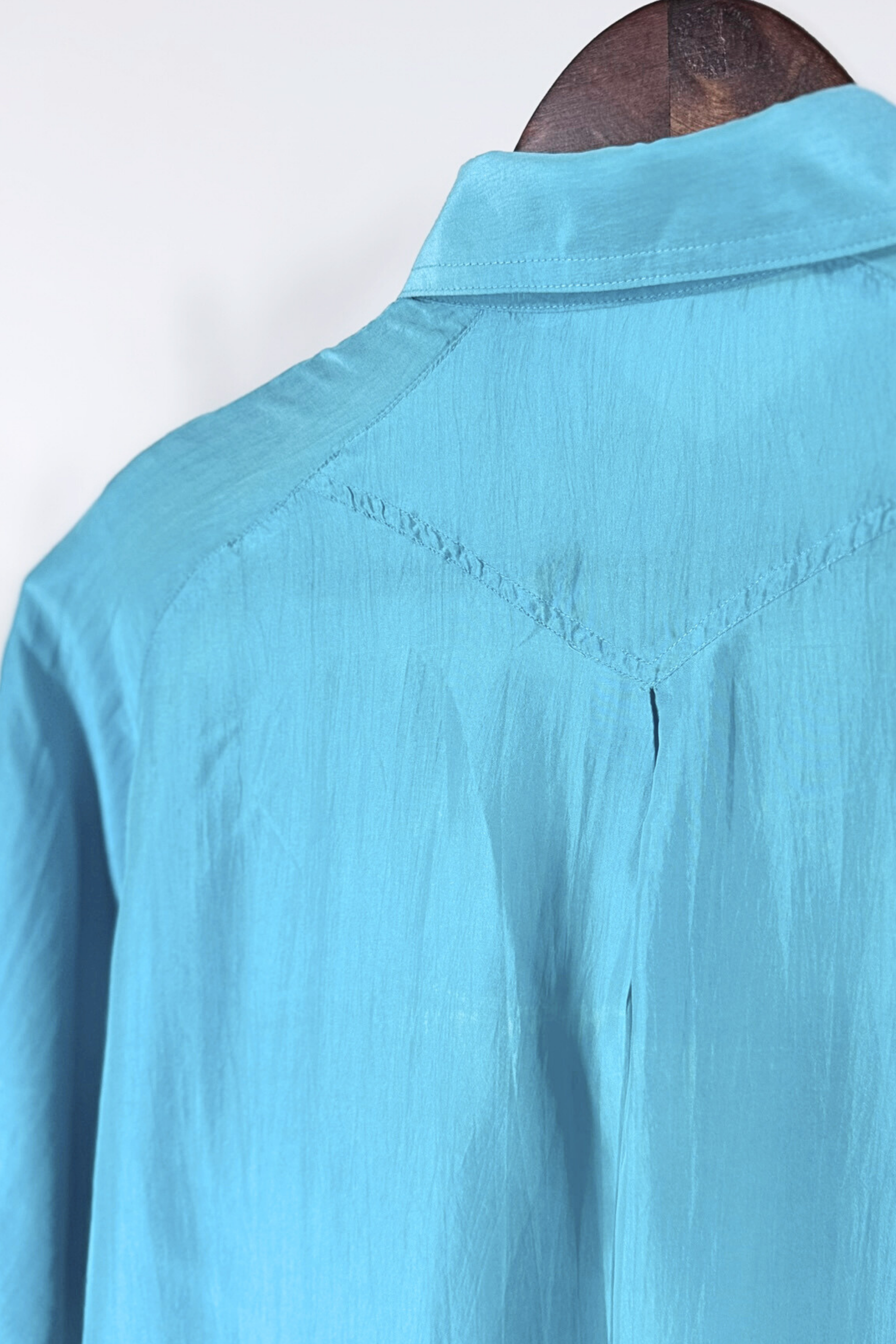 Chemisier en soie à épaulettes turquoise