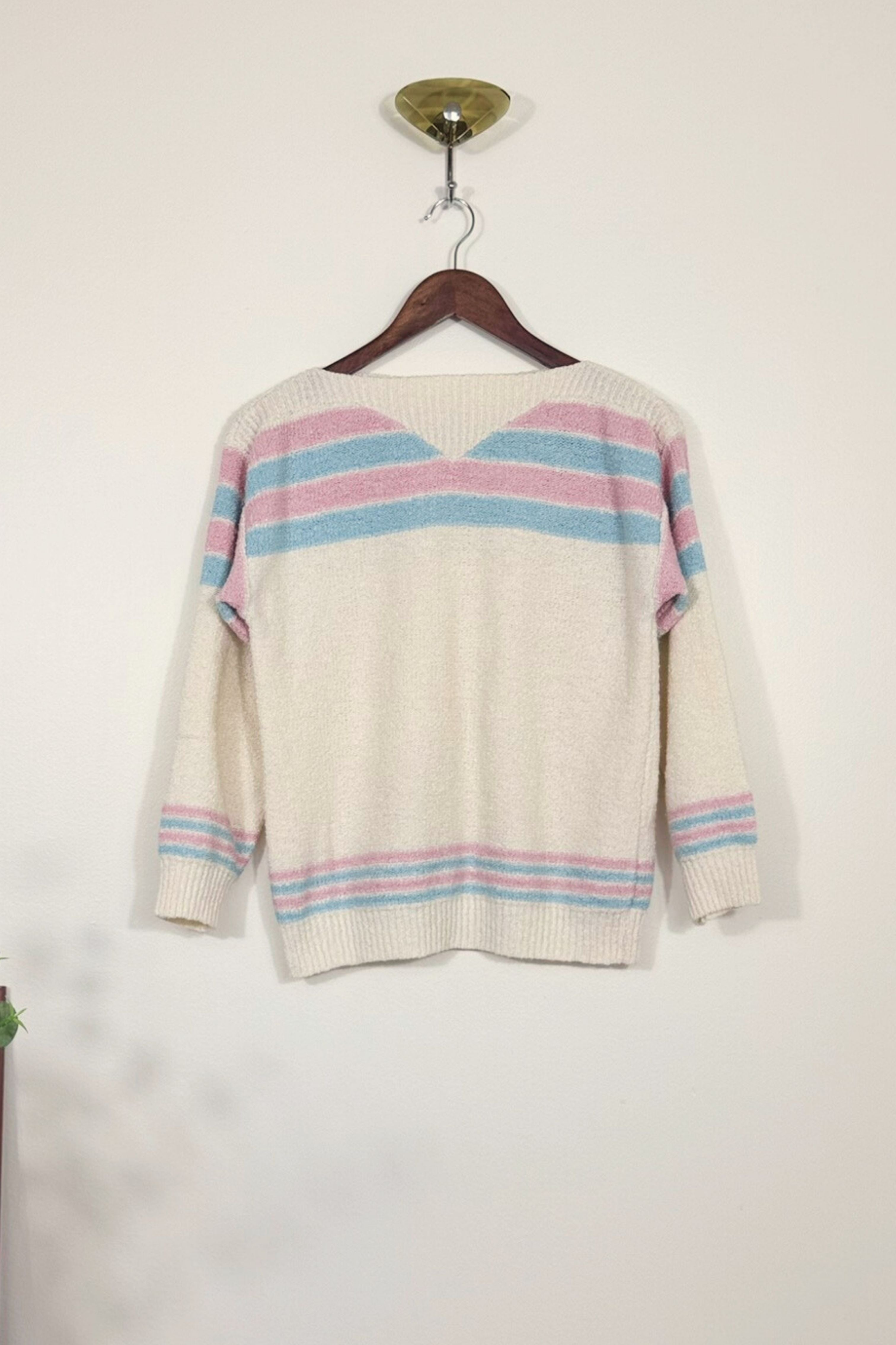Pull écru en maille bouclée