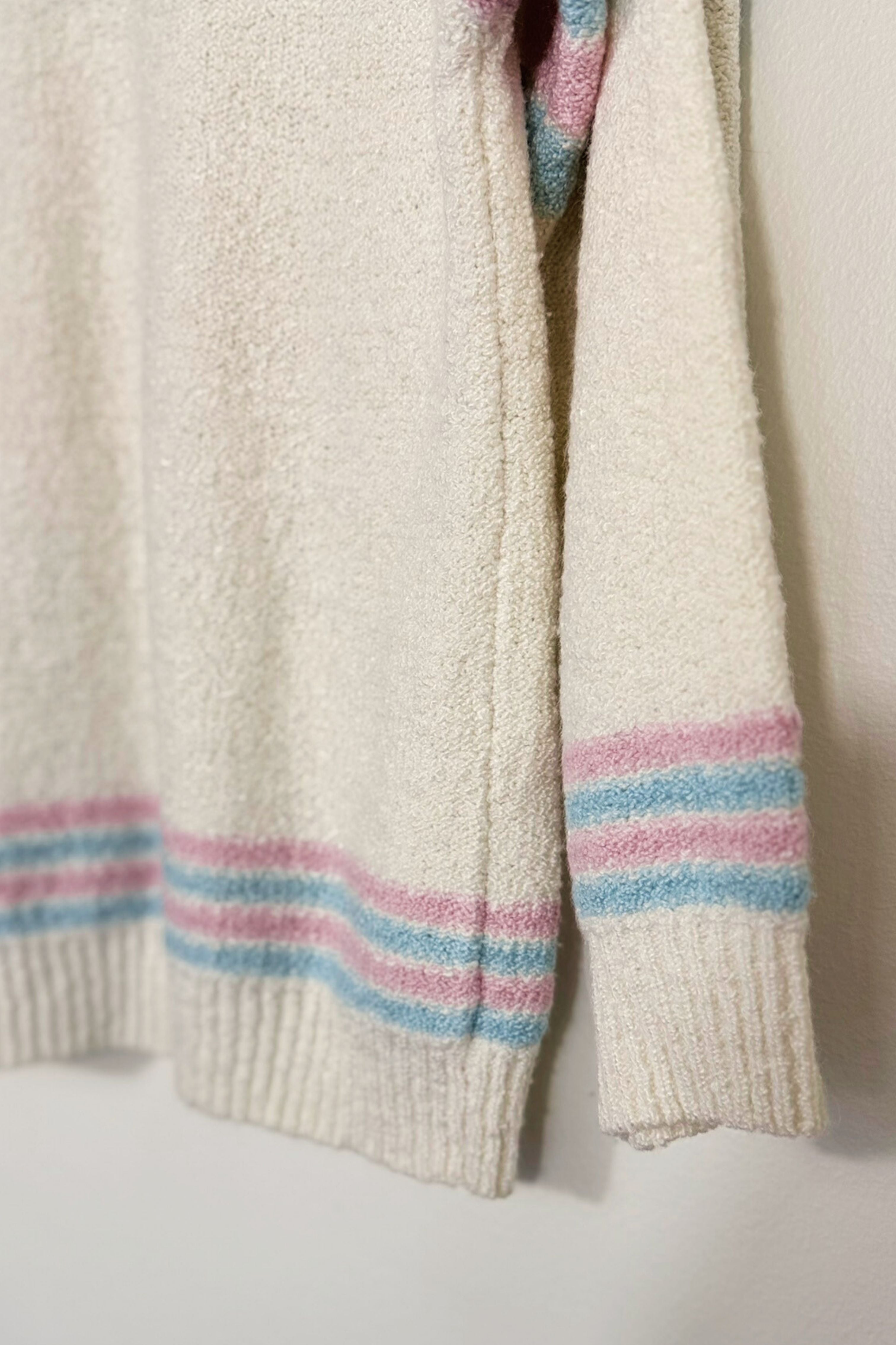 Pull écru en maille bouclée