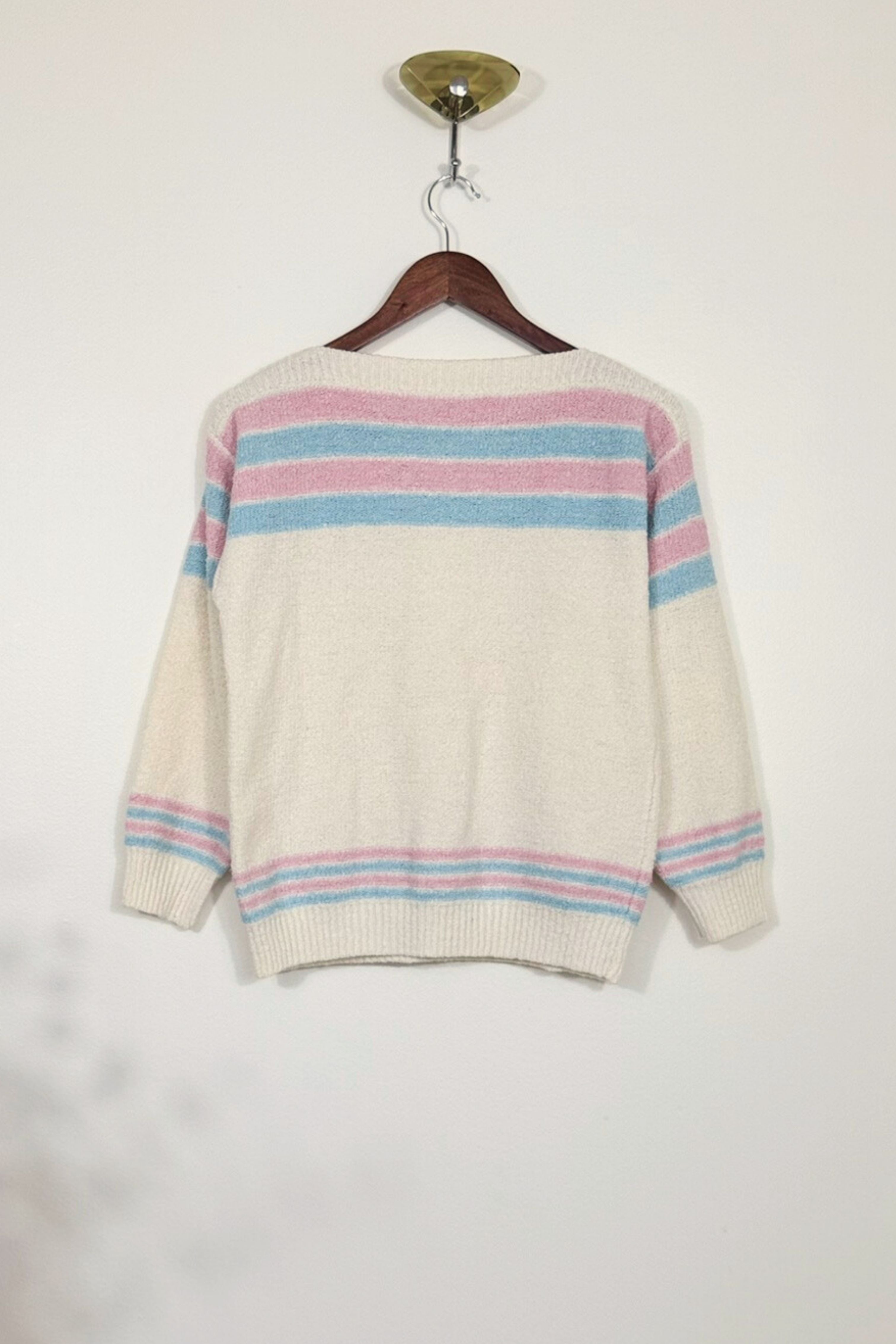 Pull écru en maille bouclée