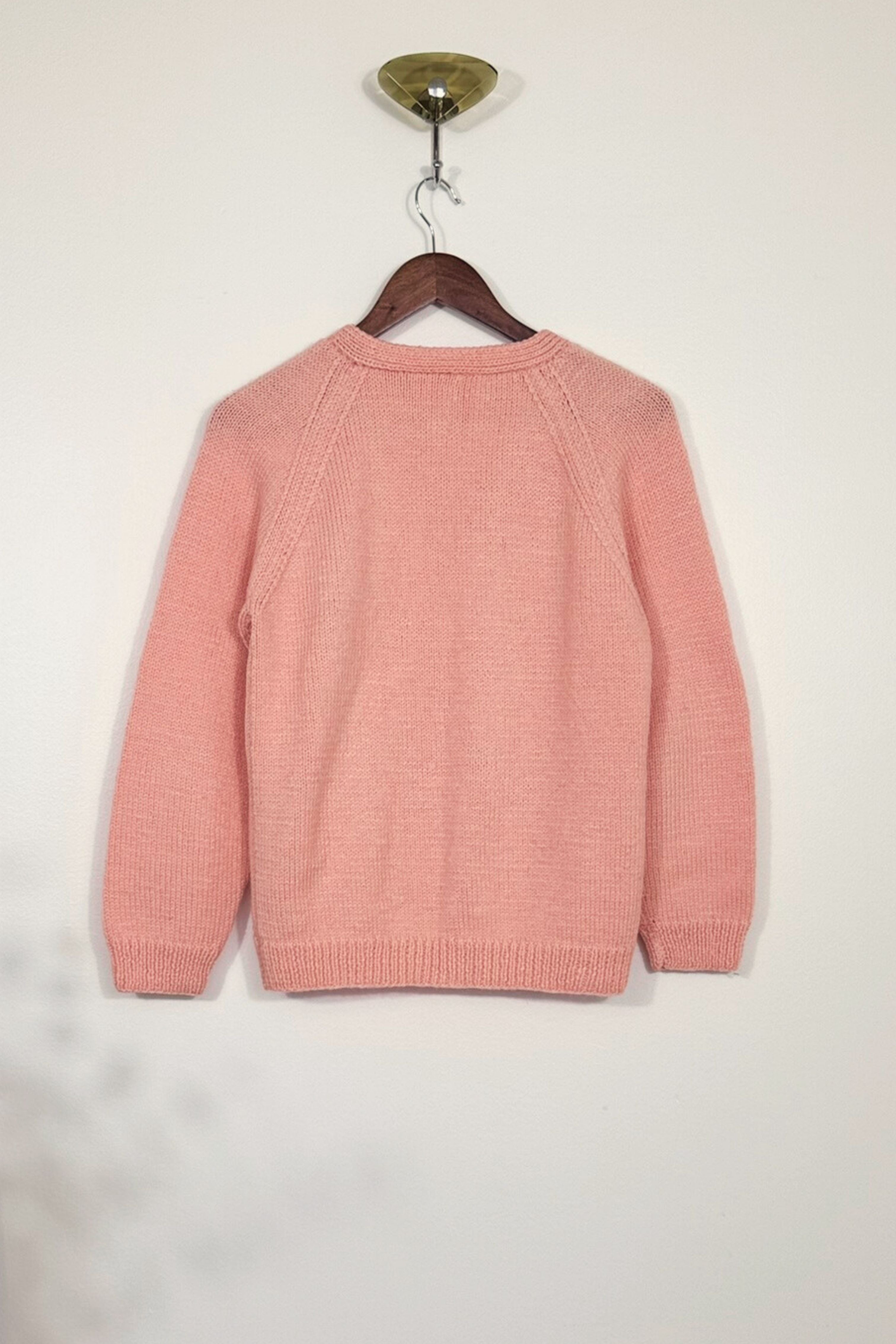 Gilet en maille tressée coton rose