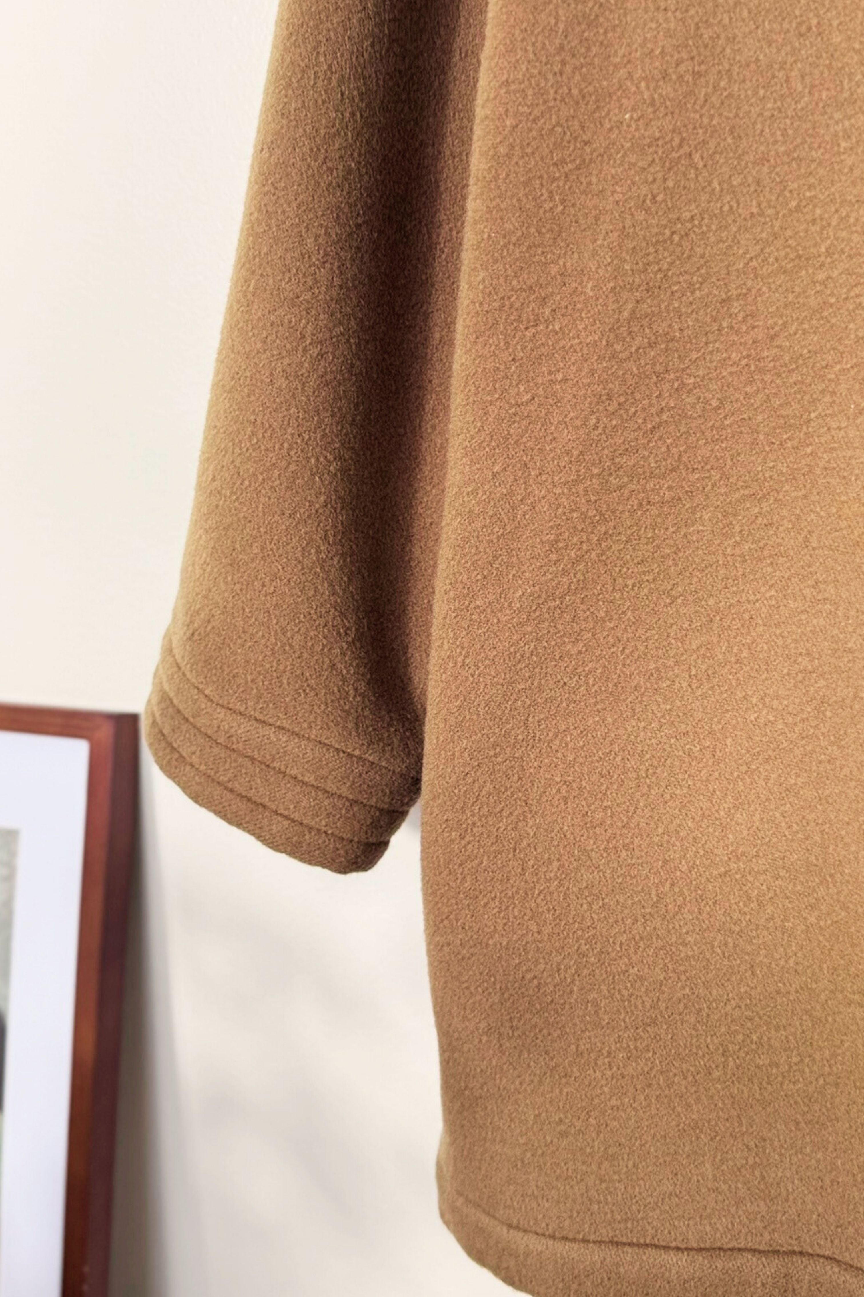 Manteau mi long en laine beige camel