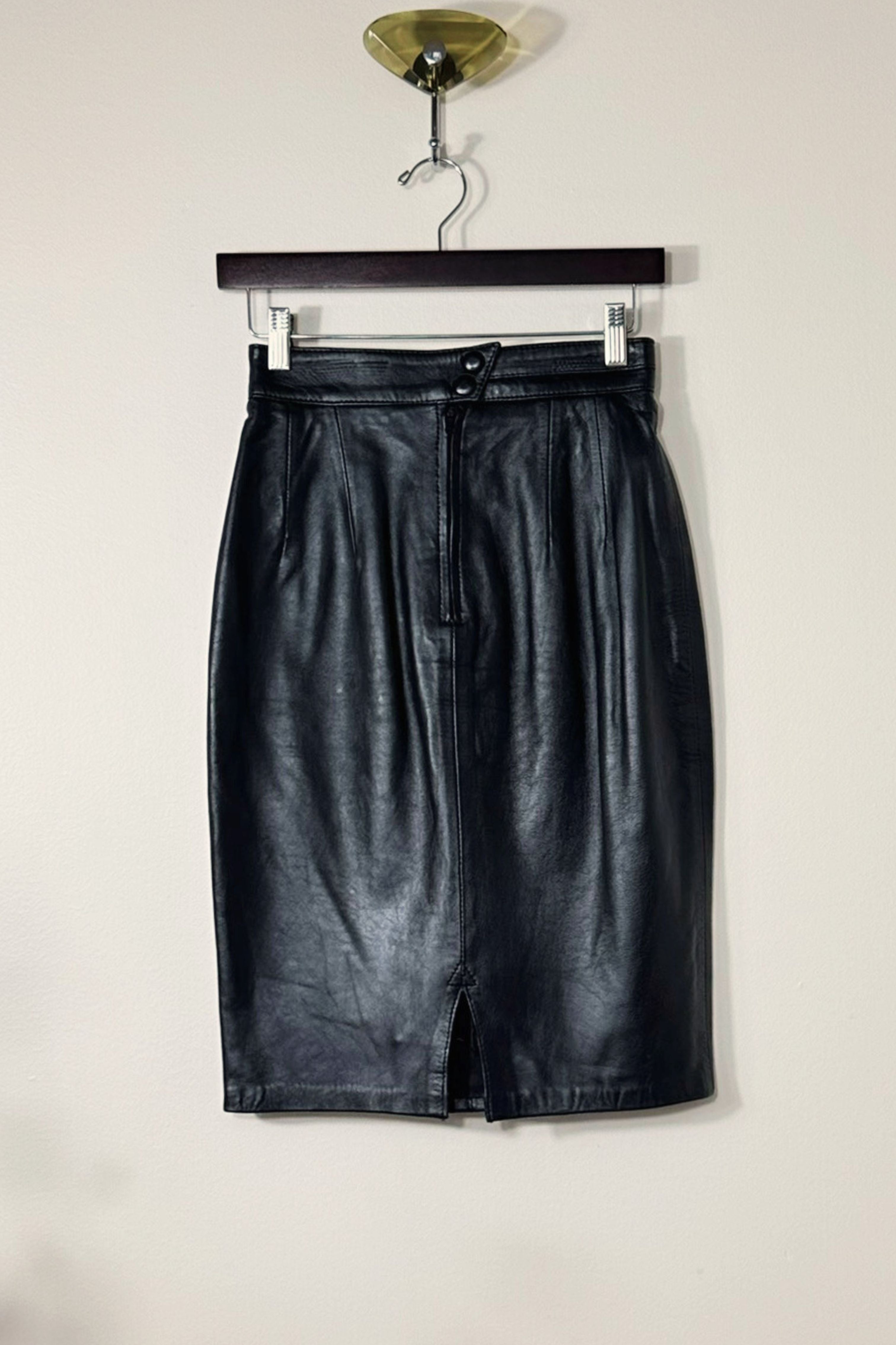 Short black leather skirt