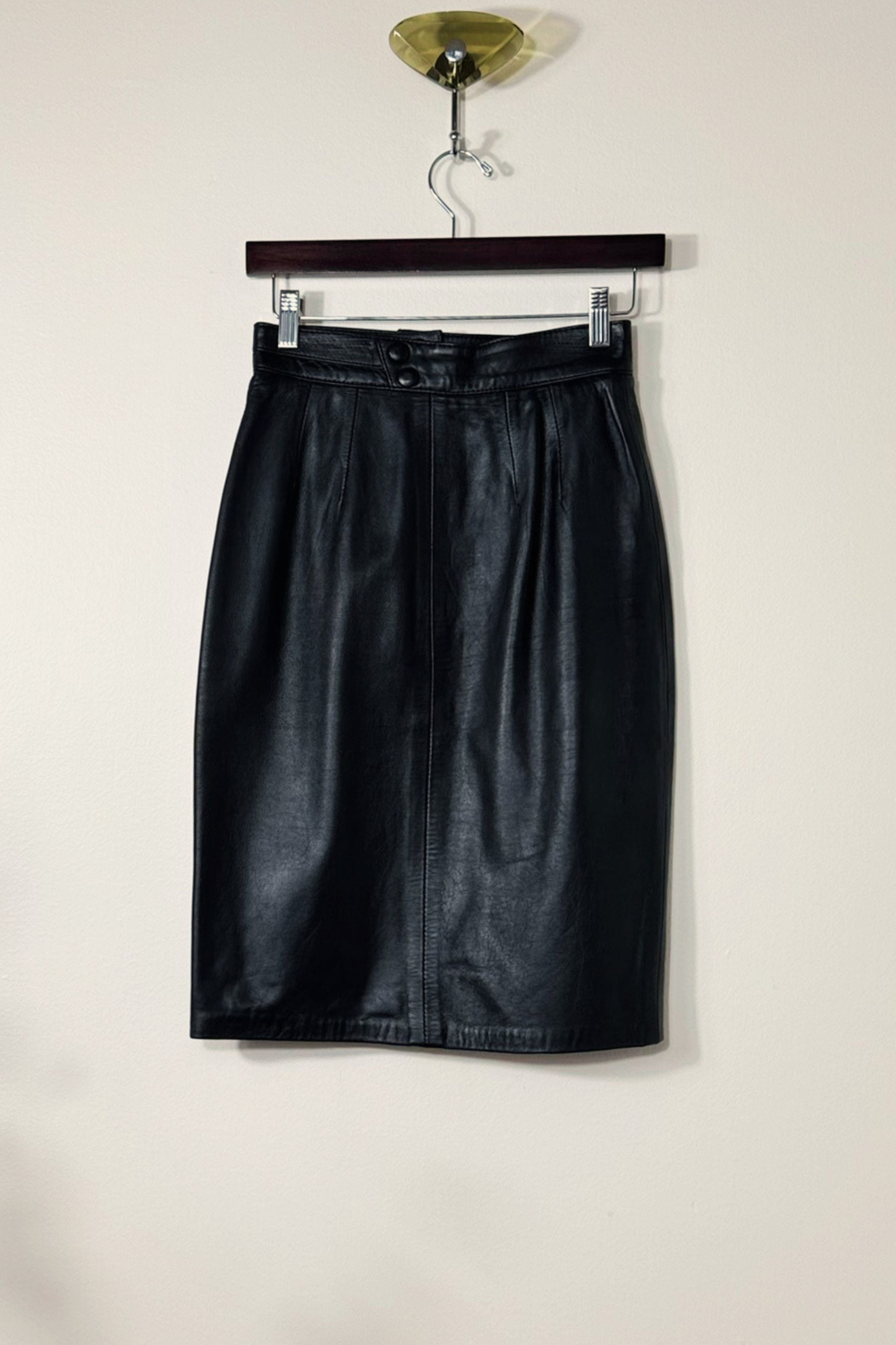 Short black leather skirt