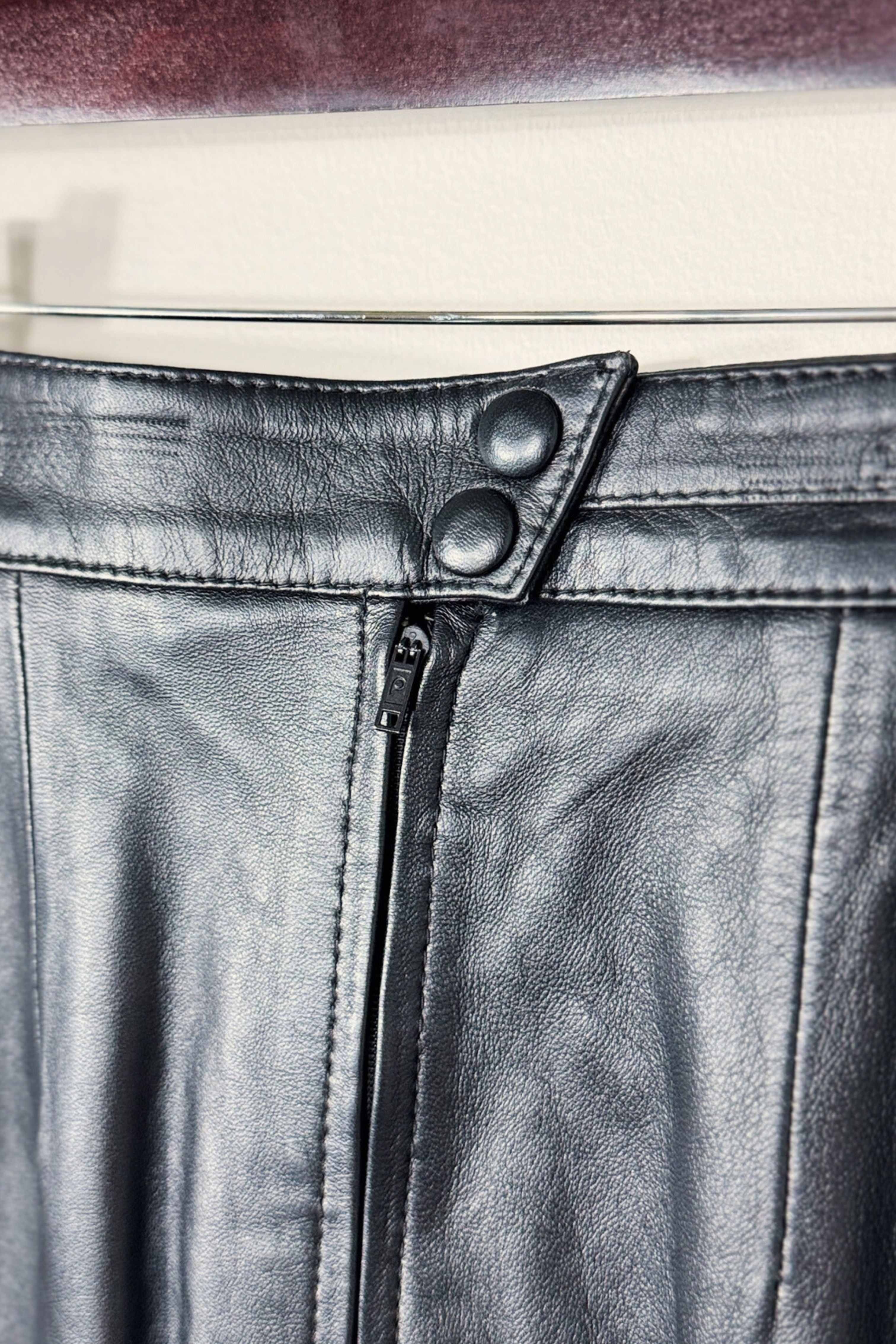 Short black leather skirt